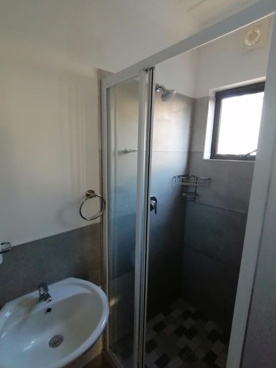 Small unit shower and basin